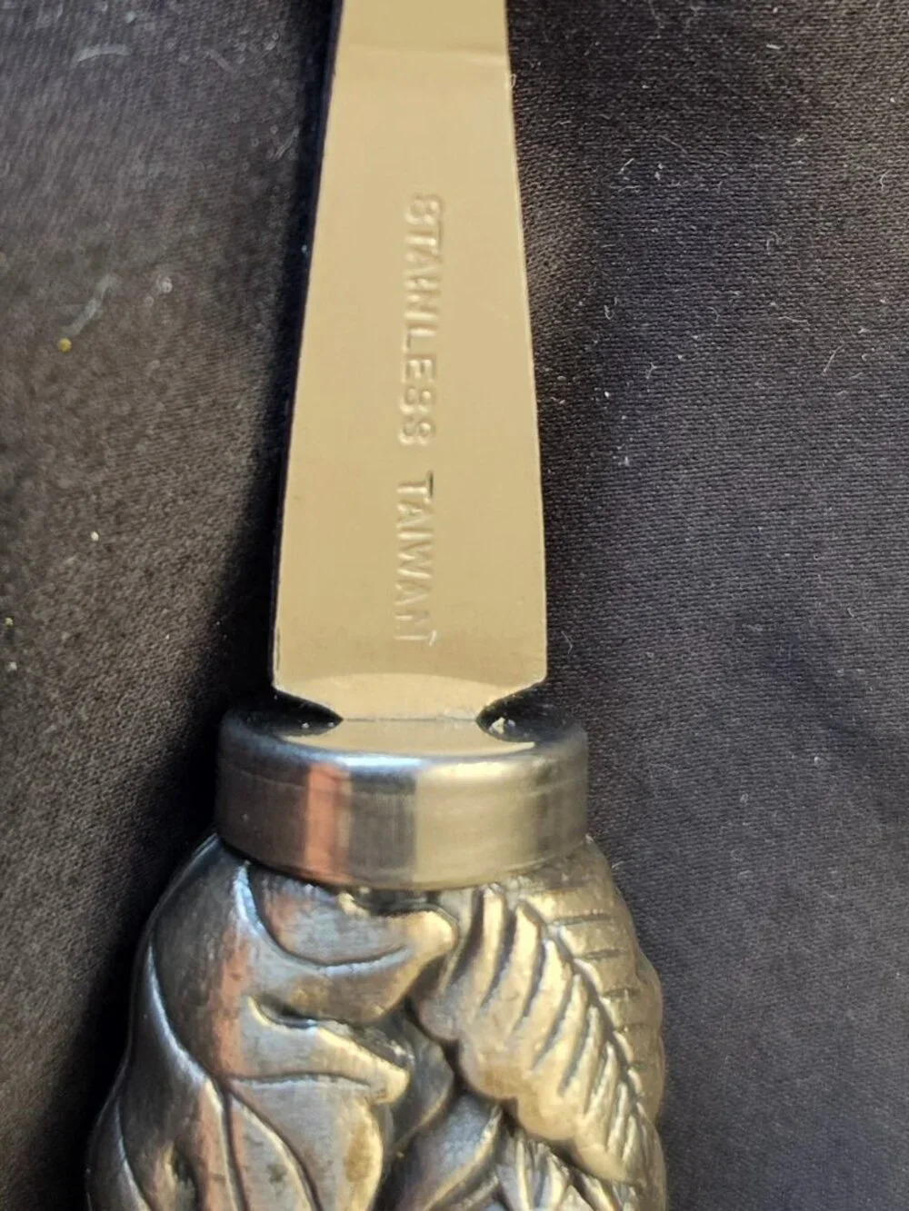Stainless cheese slicer with fruit/leaf covered nicely weighted handle-kitchen